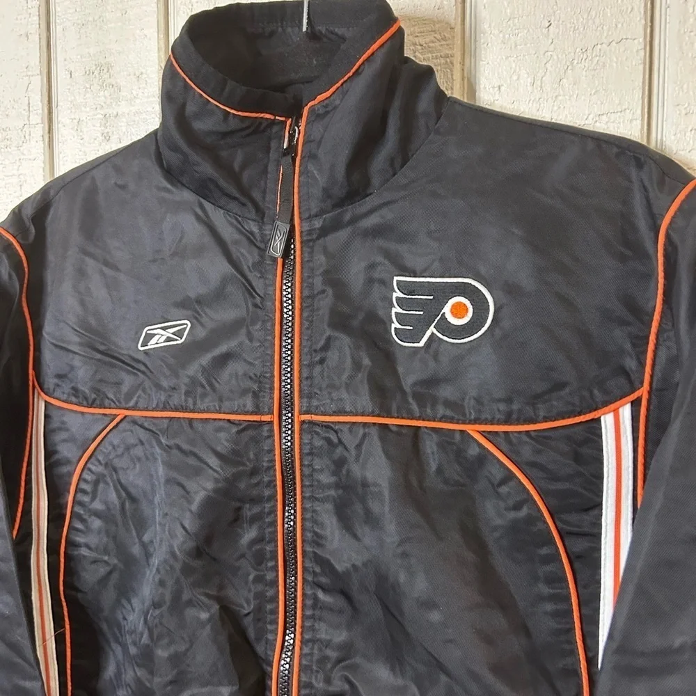 Reebok NHL Philadelphia Flyers Boys Full Zip Jacket, size Medium (10-12).